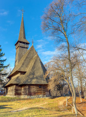 Fototapeta na wymiar The Dragomiresti wooden church in village museum, Bucharest, Romania