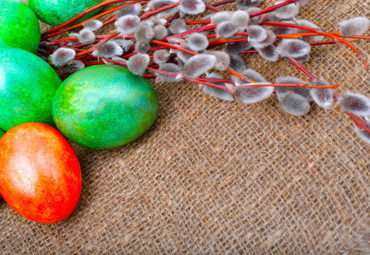 Easter green and orange eggs with and willow