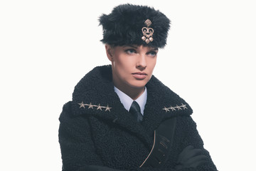 Female guard wearing retro russian winter costume with hat isola