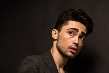 Fototapeta premium Portrait of model man's face in studio