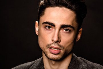 Obraz premium Portrait of model man's face in studio