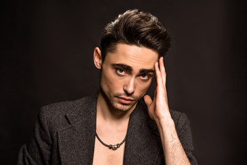 Portrait of model man's face in studio