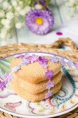 Heart-shaped butter cookies with sugar.