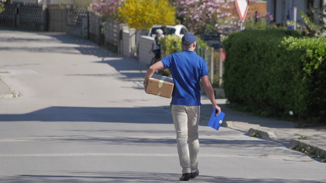 Delivery guy walking down the street