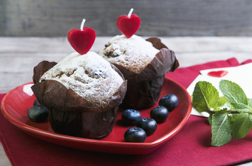 heart with two berry muffins
