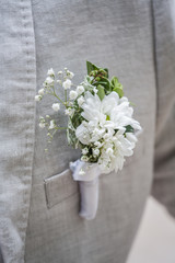 Wedding boutonniere. Wedding bouquet. Flowers.