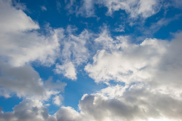 Fototapeta na wymiar Clouds in a blue sky in winter