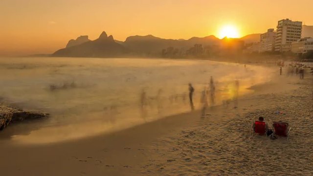 Time lapse of sunset at Arpoador Beach in Rio, Brazil.