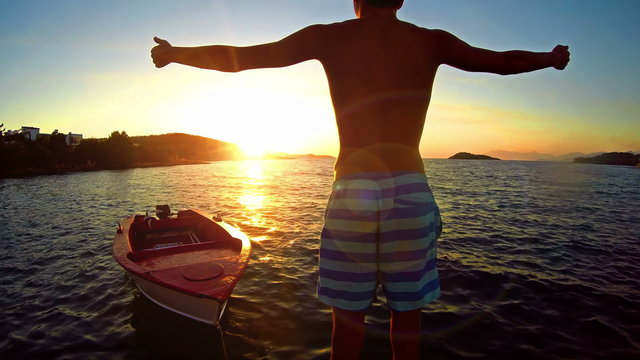WINNING CONCEPT, positive man raising hands 
