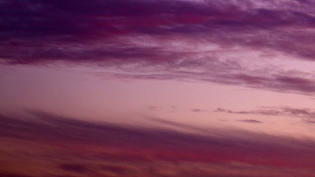 Royalty Free Stock Video Footage of purple clouds at sunset shot in Israel at 4k with Red.