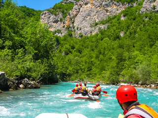 rafting boat on the fast mountain river - obrazy, fototapety, plakaty