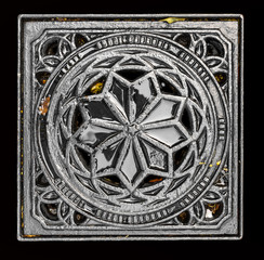 wet man hole or sewer cap isolated on black