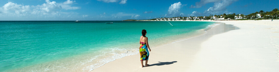 Fototapeta na wymiar Woman in Caribbean Beach