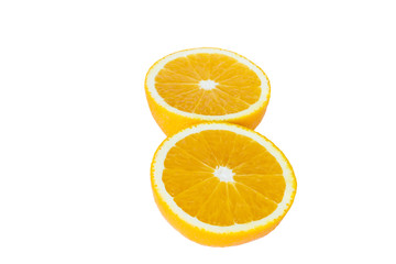 Orange halves arranged on white background.