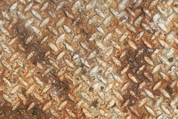 Texture of rusty old diamond plate metal