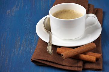 Cup of coffee with cinnamon
