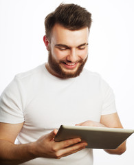 young man  using a tablet computer 