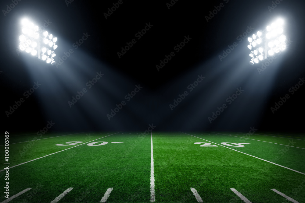 Sticker Football field illuminated by stadium lights