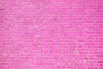 Pink brick wall background.