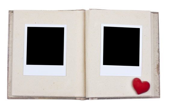 Photo album with frame and red heart