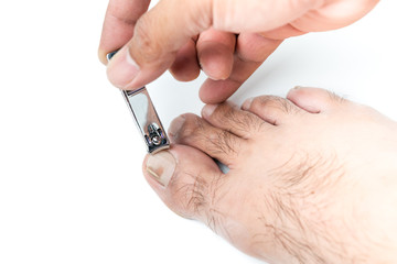 Hand man use a nail cliper to cut toenail