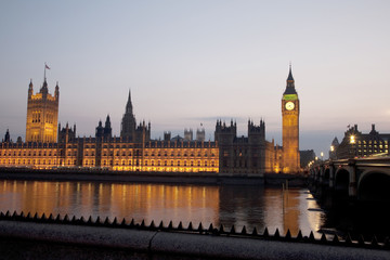 Fototapeta na wymiar Houses of Parliament and Big Ben illuminated at night in London, England, UK