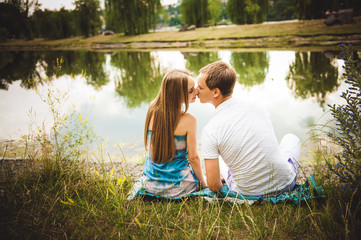 Pregnant Couple on the park