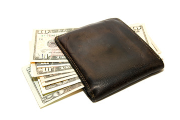Old  wallet with banknotes of US dollars inside