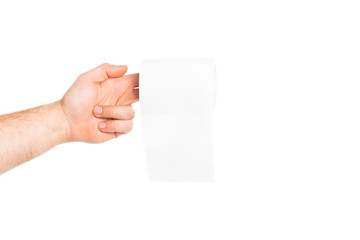 Hand holding toilet paper roll