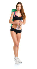 Beautiful sport woman with mat for fitness and bottle of water i
