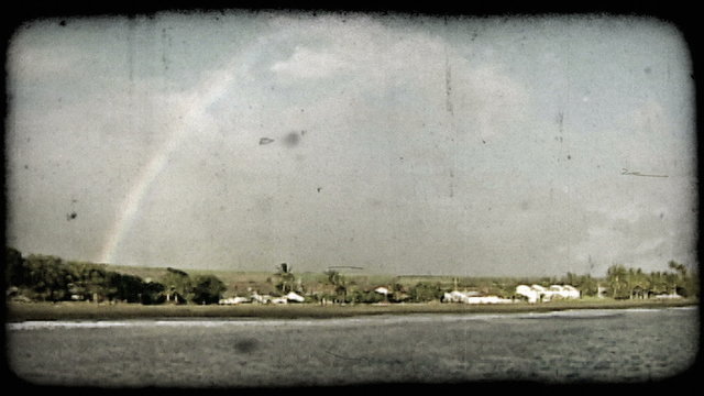 Rainbow and town 1. Vintage stylized video clip.