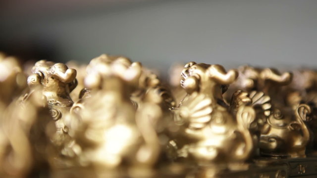 Gold Figurine Display