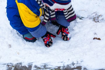 Child playing outdoor at winter