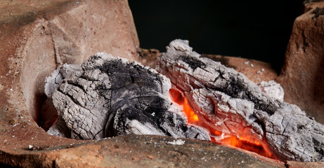burning charcoal in old stove, thailand tradition