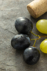 grapes and wine cork