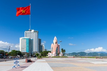 Nha Trang, Vietnam - December 09, 2015: Daytime view of Tram Huong (Lotus Flower) Tower and Nha Trang skyline in a sunny day on December 9, 2015, Nha Trang, Vietnam.