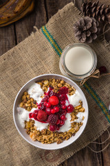 Top view of muesli on wooden table