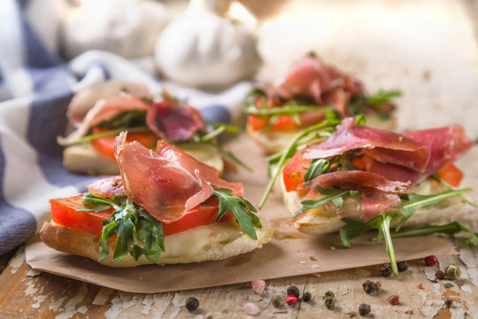 Bruschetti on wooden table