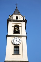 Fototapeta na wymiar cadrezzate old church tower bell sunny day