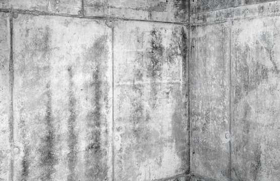 Grungy concrete interior fragment with corner