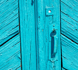 greece home texture of a blue antique wooden old door in santori