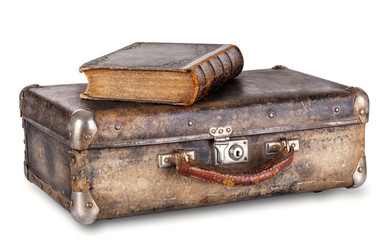 Old book on a suitcase