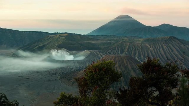 Time-lapse of Mount Bromo with volcaninc smoke going out of a crater