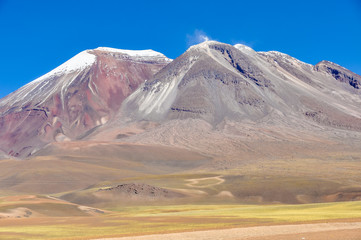 Colorful volcanoes in the high Andean plateau in Bolivia