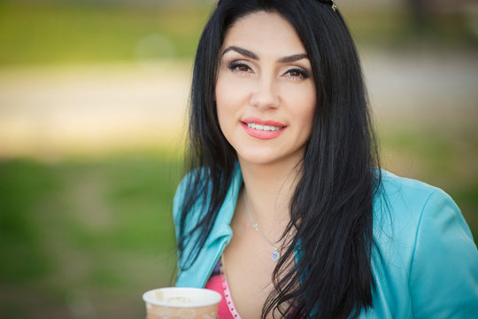 Beautiful Middle Age Woman Drinking Coffe In Cafe  Outdoor