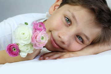 Obraz na płótnie Canvas boy with flowers
