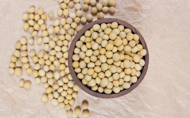 Soya beans on paper surface.