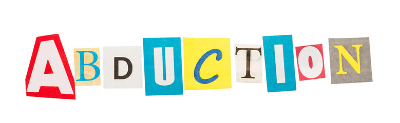 The word Abduction made up of  cut out  letters