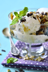 Vanilla ice cream with caramel and walnuts.