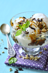 Vanilla ice cream with caramel and walnuts.